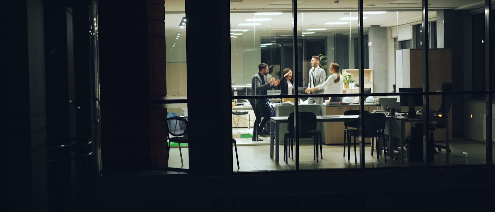 An office lit for evening work near the end of the season