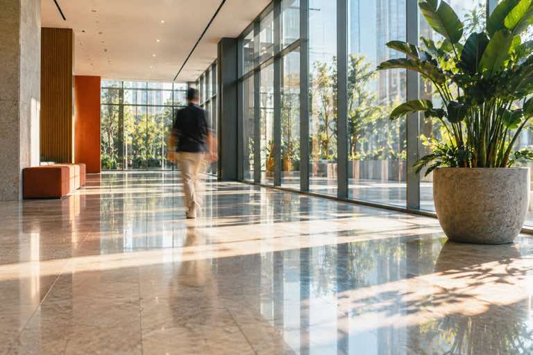 Sunlit modern lobby with polished floors