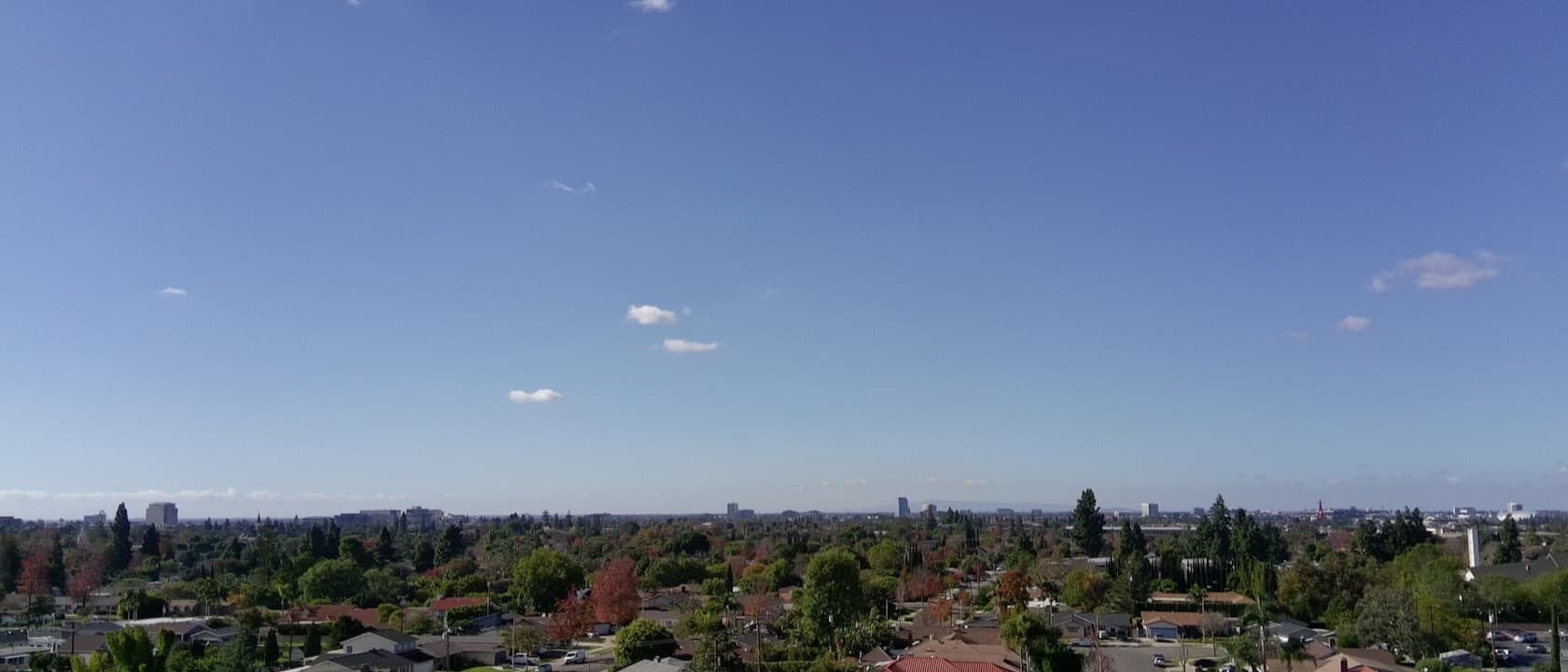 A neighborhood of houses under a clear sky