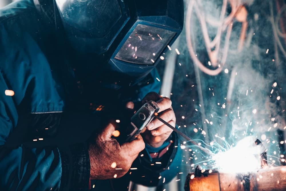 A man welding in a workshop