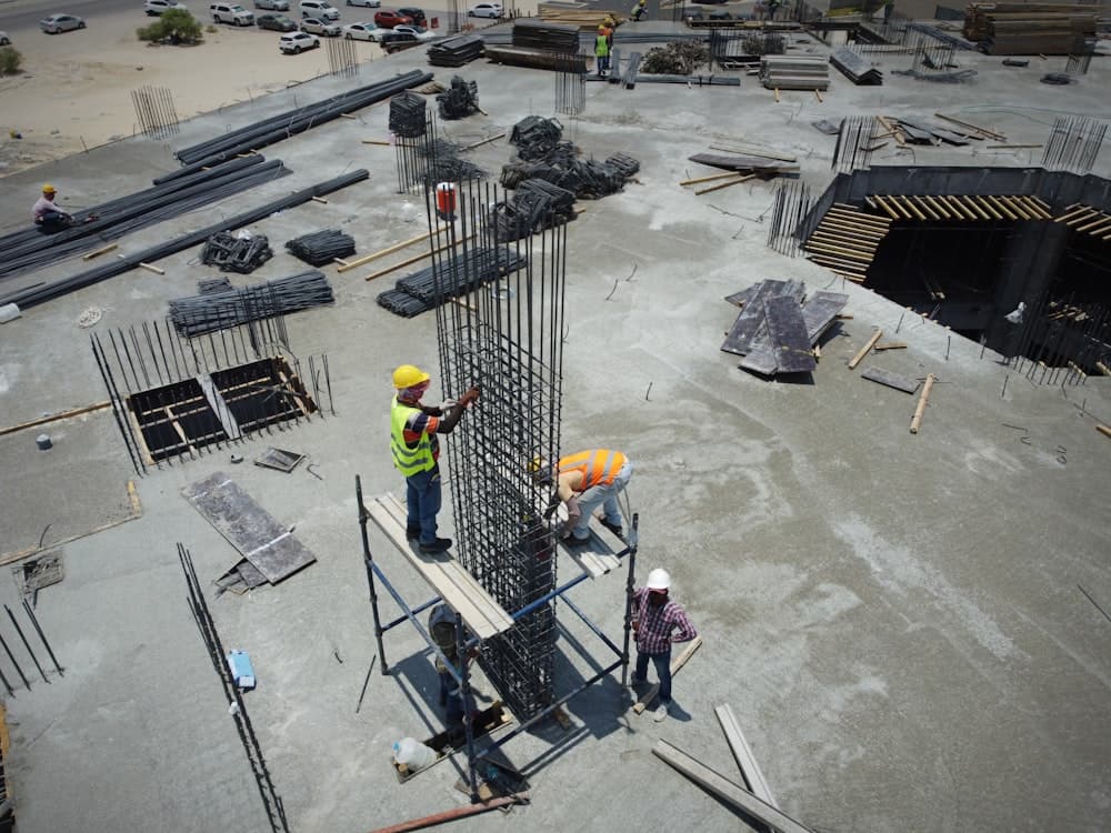 A construction crew standing on site