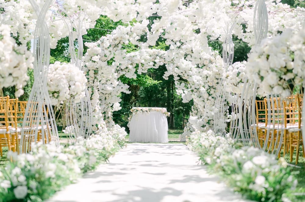 A venue courtyard with white flowers in bloom