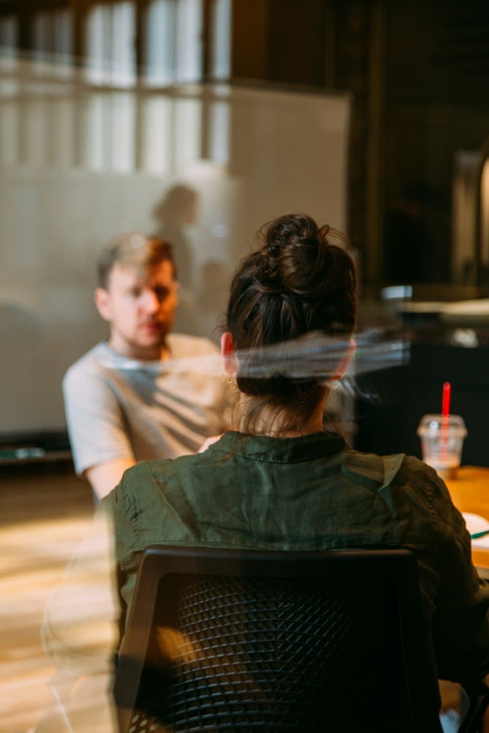 A one-on-one coaching session in armchairs