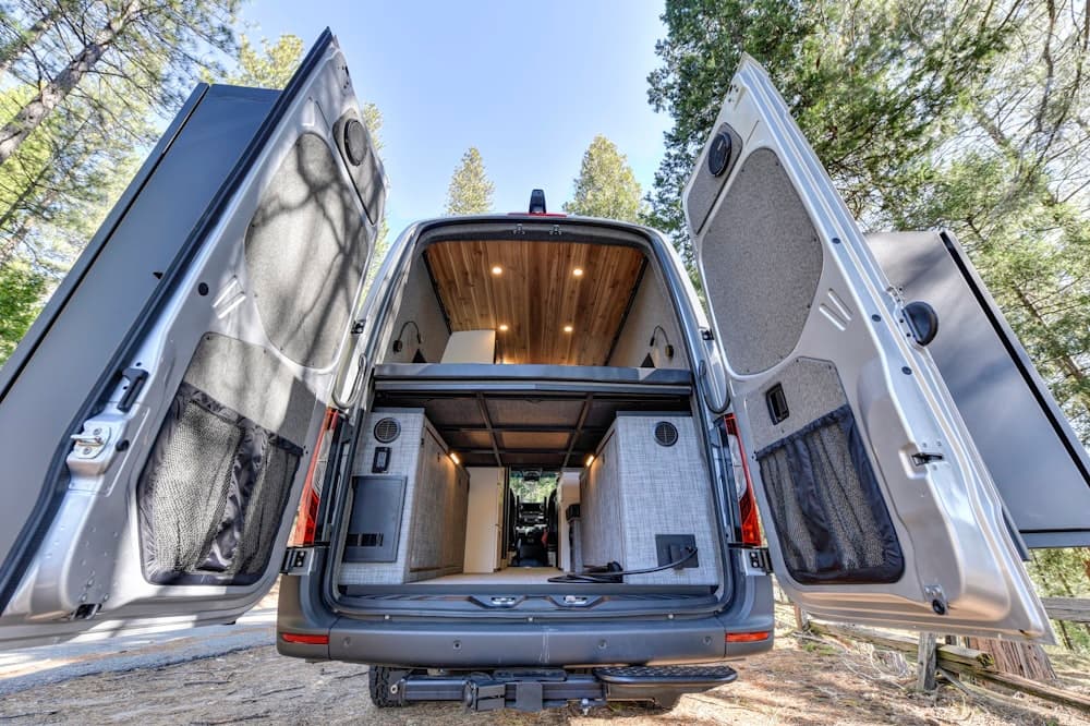 The back of a work van with its doors open