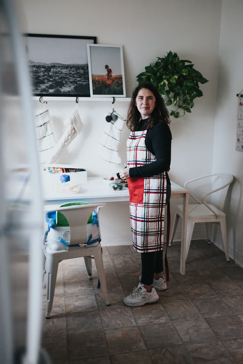 A woman standing in her textile studio