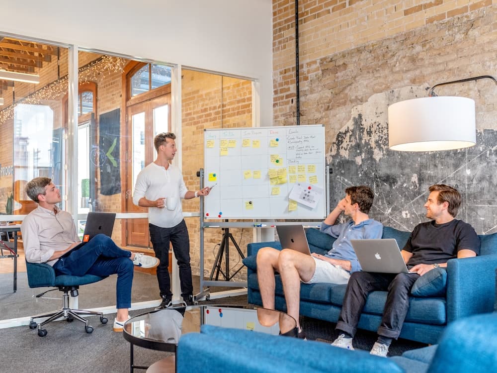 A founder presenting a product demo on a screen